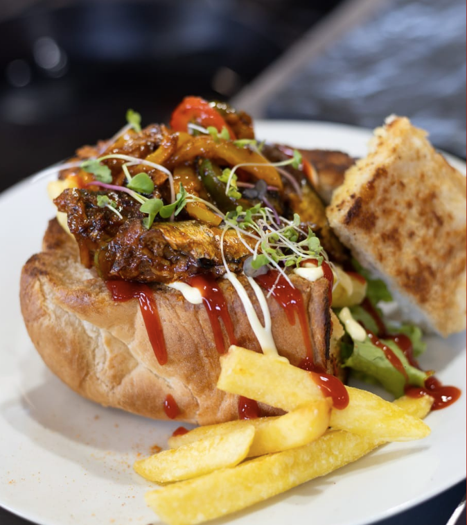 Lucky Chow kota close-up with sauce and chips